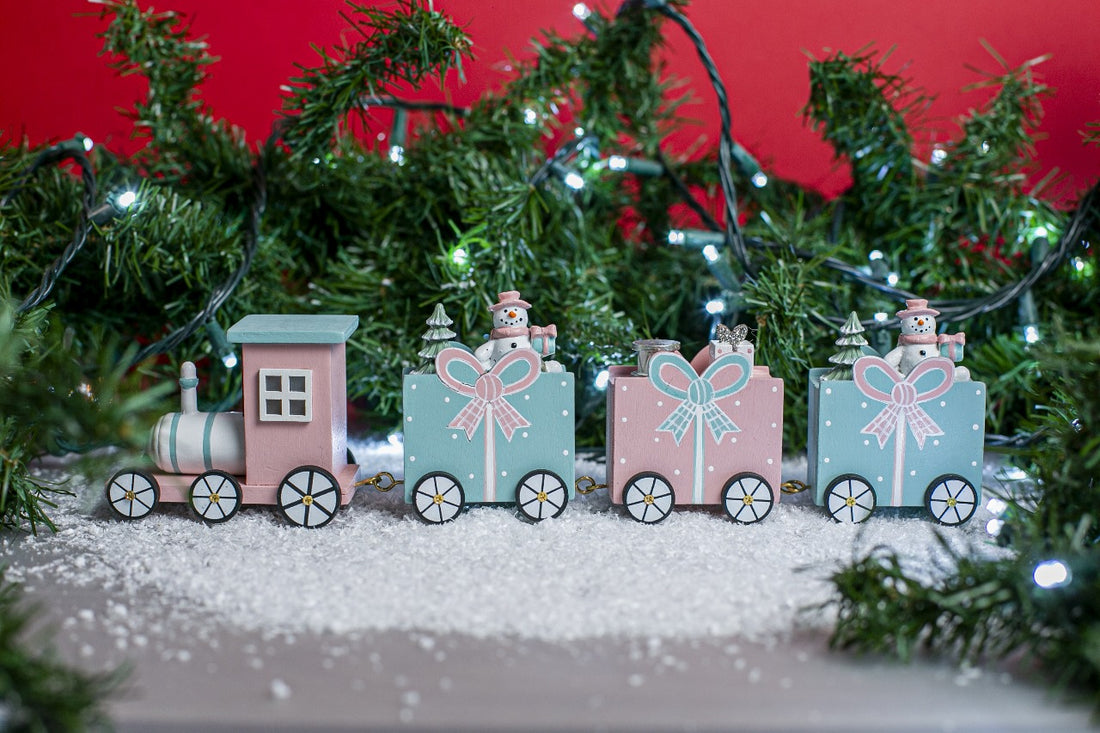 The Elf Hut Tren Rosa Azul Copo de Nieve